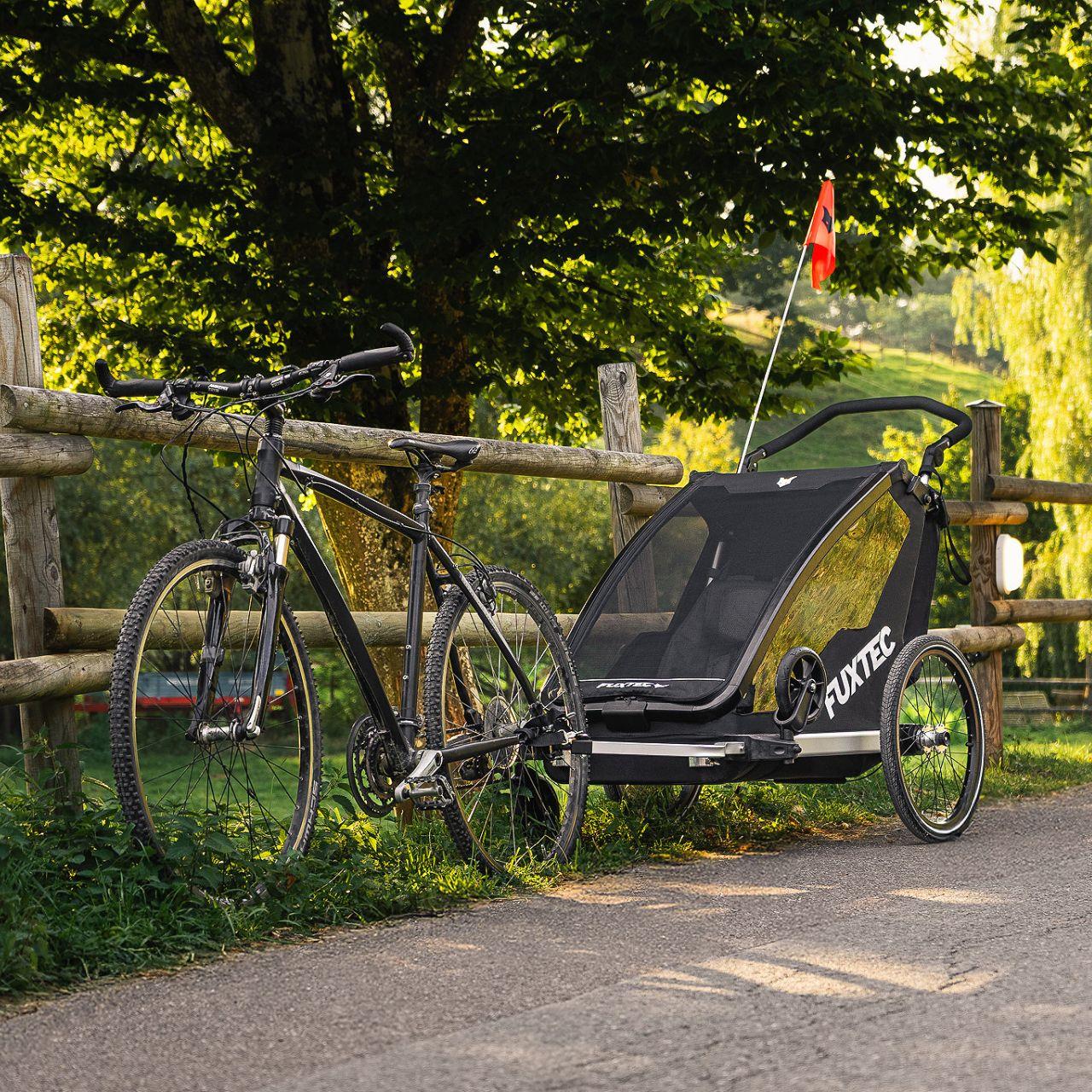 Prívesný vozík za jízdní kolo FUXTEC FX-FA1-SET-PURPUR s koleckem pro jogger